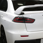 Spec-D 08-17 Lancer EVO X LED Tail Lights Black/Clear Lens Red Bar